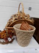 A quantity of basket ware and dried flowers
