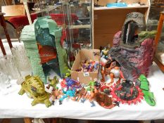 A collection of He-Man and The Masters of the Universe toys including Castle Greyskull in box,