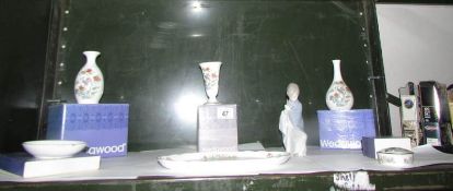 A quantity of boxed Wedgwood and a Lladro figure
