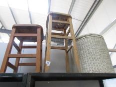 2 stools and a linen bin