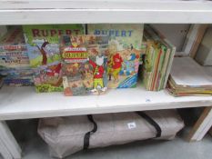 A large collection of Rupert Bear annuals and comics