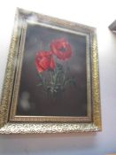 A gilt framed print of poppies