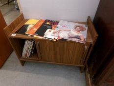 A record cabinet containing LP records