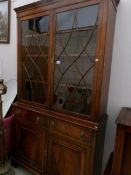 An astragal glazed bookcase