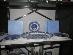 7 boxed blue and white Royalty plates and a large blue and white platter