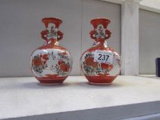 A pair of oriental Kutani vases