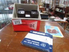 A vintage bakelite 3D viewmaster with slides