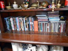 A quantity of DVD's and CD's