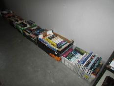 7 boxes of assorted hardback and paperback books