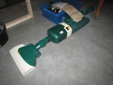 A Vorwerk vacuum cleaner with accessories