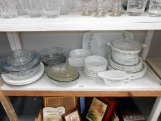 A shelf of assorted pyrex