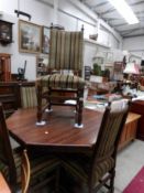 An oak octagonal table and 4 chairs