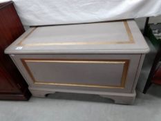 A painted pine blanket box