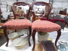 A pair of Victorian mahogany cabriole leg chairs