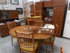 A Stag dining table and 5 chairs