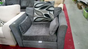 A grey arm chair