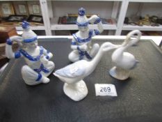 2 Lladro geese and a pair of Siamese blue and white figures
