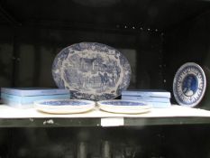 A large blue and white platter together with 7 Wedgwood blue and white royalty collectors plates