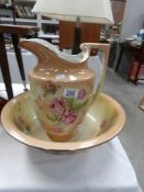 A large floral jug and basin set