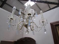 A 5 lamp glass chandelier