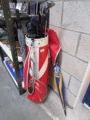 A golf bag, clubs,