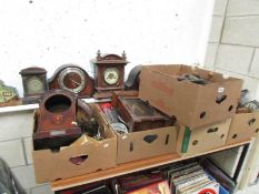 A large quantity of clocks and clock parts