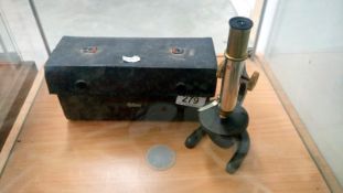 A cased microscope