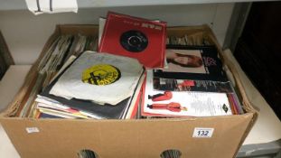 A quantity of 45 rpm records from 1970/80/90's