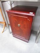 A mahogany effect cabinet