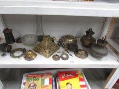 A quantity of oil lamp parts