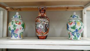 A large late Imari vase and 2 lidded oriental jars
