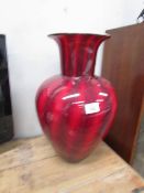 A large red vase