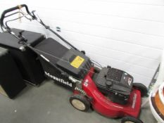 A Mountfield petrol mower