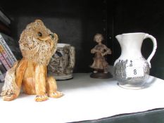 An art pottery dog, a German stein,