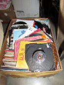 A quantity of 45 rpm records from 1970/80/90's