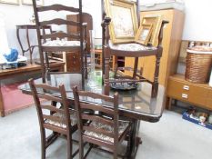 An oak refectory style table and 6 chairs