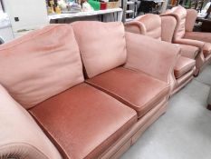 A pink 3 piece suite