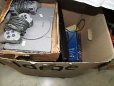 A box of PC equipment including Sony Playstation one