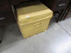 A large tin trunk