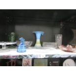 A shelf of assorted glass ware including carnival glass bowl