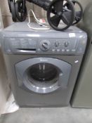 A silver coloured Hotpoint automatic washing machine