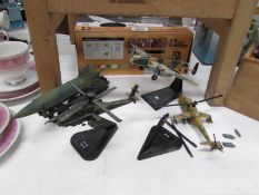 A quantity of aeroplane and helicopter military models including Syma radio controlled Chinnook