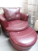 A leather arm chair and stool