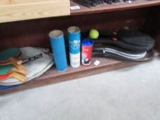 A mixed lot of badminton and table tennis equipment
