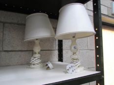 A pair of table lamps