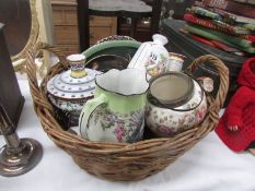 A basket of china items