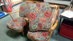 2 1970's Ercol armchairs and foot stool