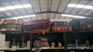 9 suitcases including vintage