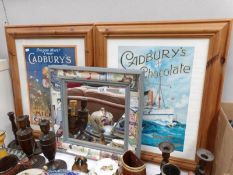 2 framed reproduction Cadbury's posters and a mirror with advertising decoration to frame