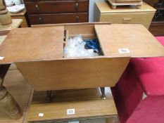 A sewing box and contents